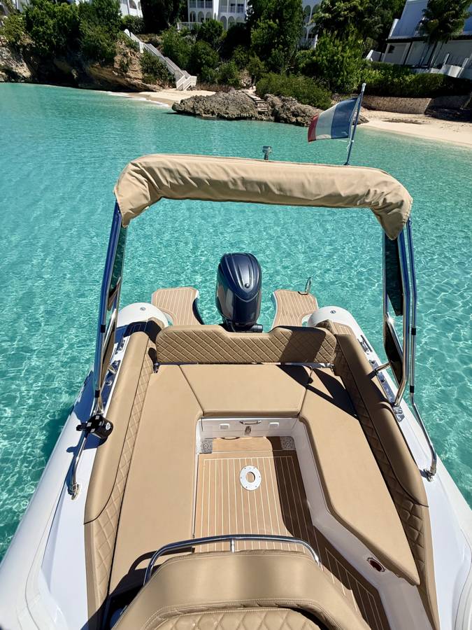 ONE LIFE 29: the rear lounge under the bimini, anchored off a beach in Saint-Martin