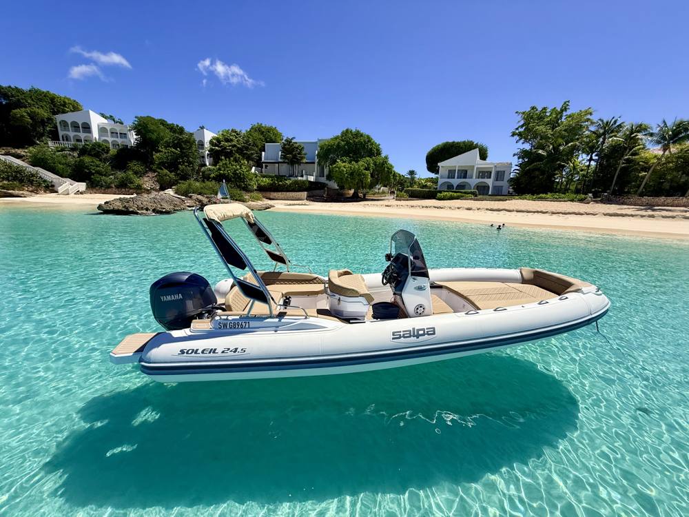 ONE LIFE 29, a Salpa Soleil 24.5 RIB for rent in Saint-Martin, at anchor off the beach